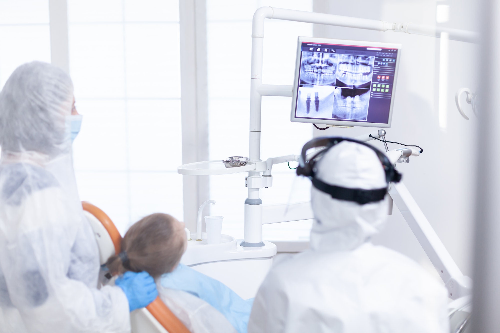 Orthodontist analyzing digital radiography